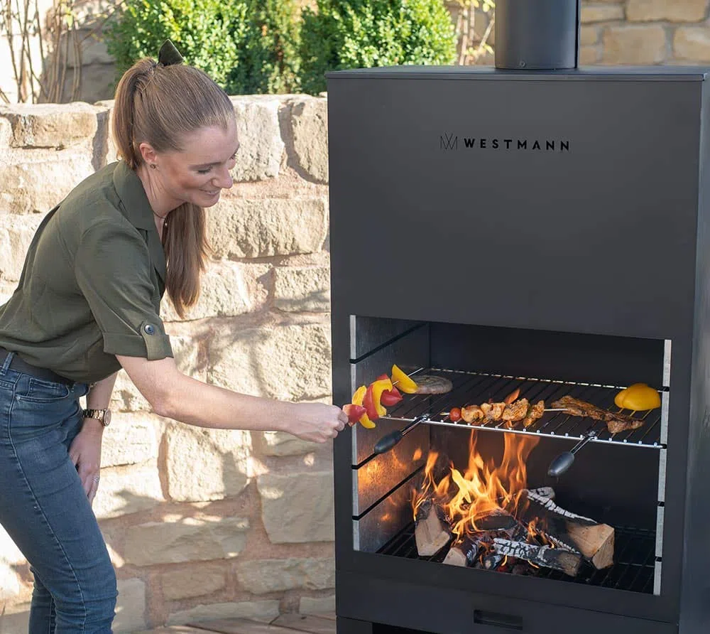 WESTMANN Terrassenofen & Grill | 70x41x229 cm Schwarz | Gartenkamin aus pulverbeschichtetem Stahl | Feuerstelle für Garten & Terrasse